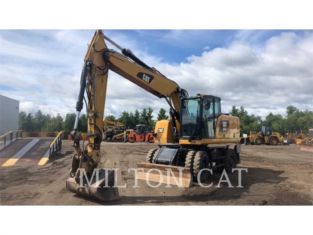CAT M320F Gumikerekes kotrók