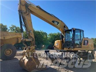 CAT M320FL Gumikerekes kotrók