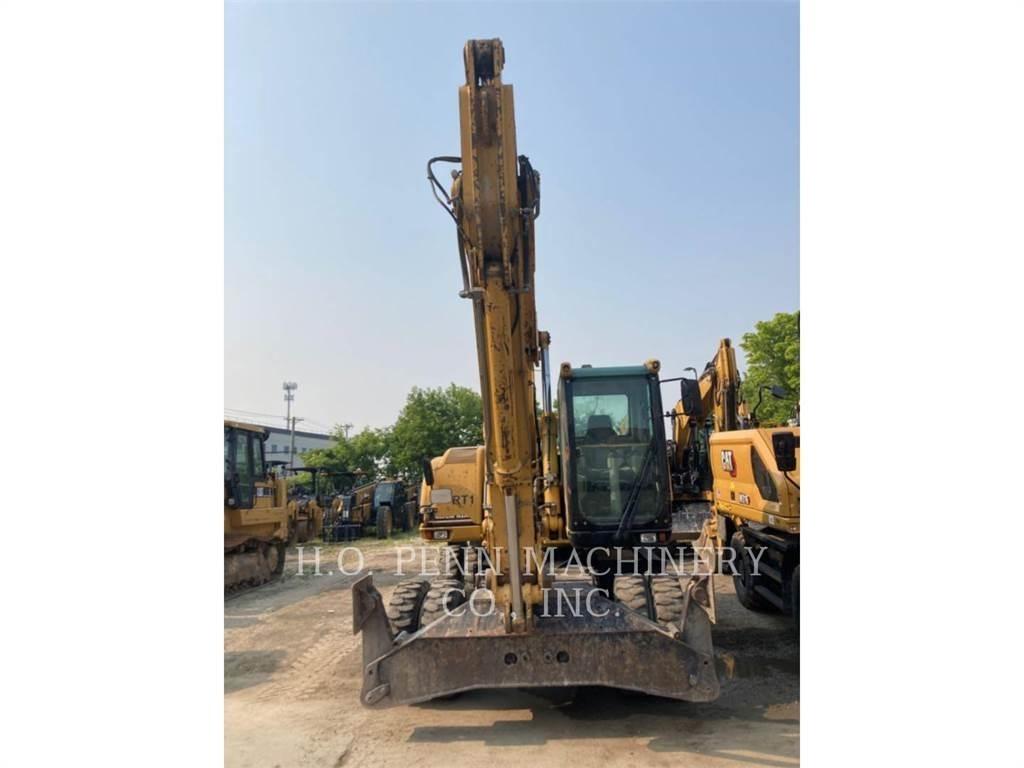 CAT M322C Gumikerekes kotrók