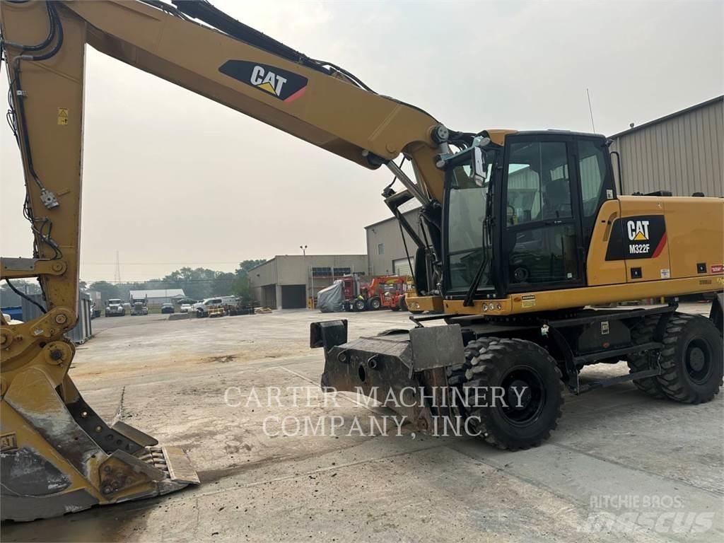 CAT M322F Gumikerekes kotrók