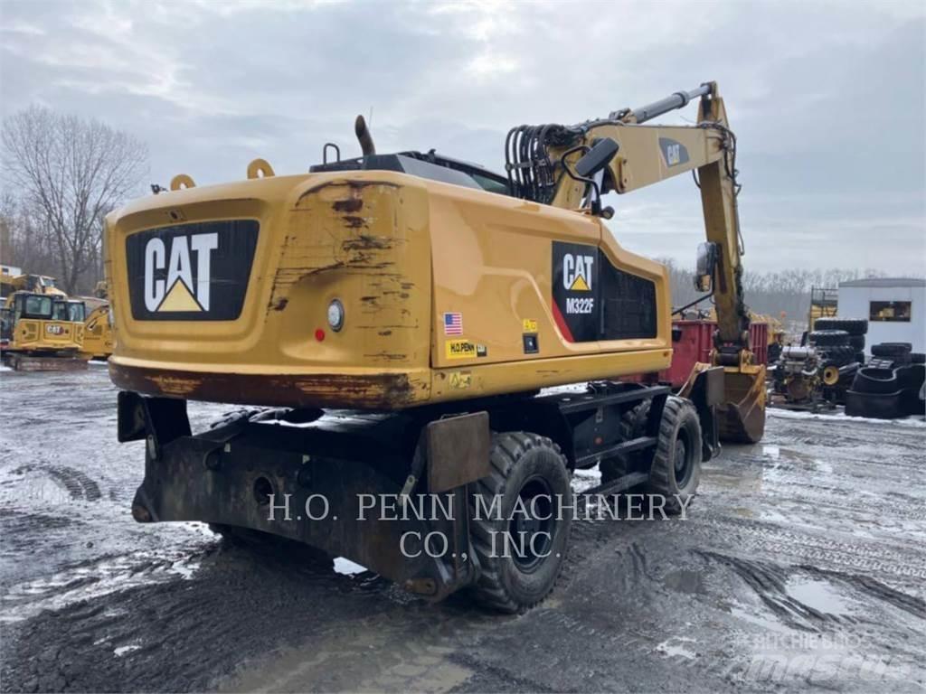 CAT M322F Gumikerekes kotrók