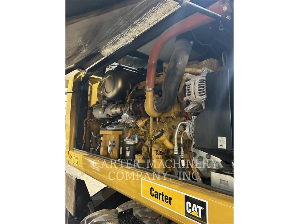 CAT M322F Gumikerekes kotrók