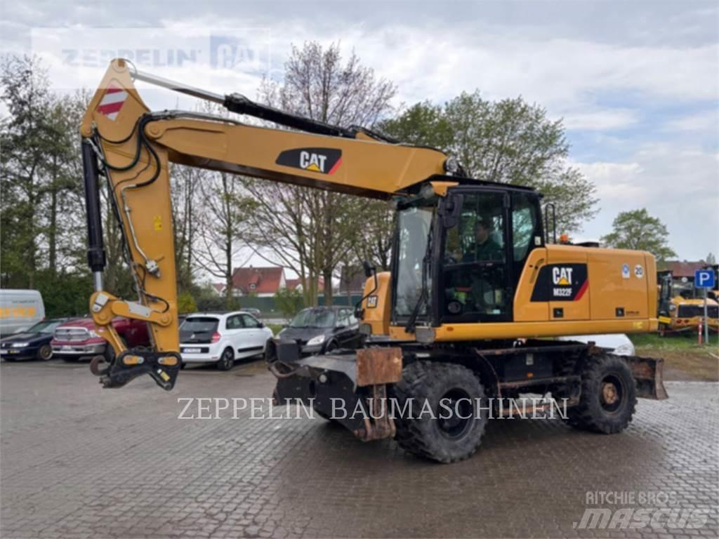 CAT M322F Gumikerekes kotrók
