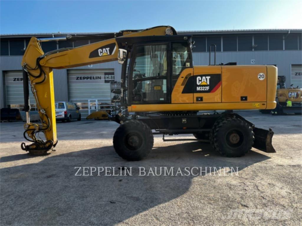 CAT M322F Gumikerekes kotrók