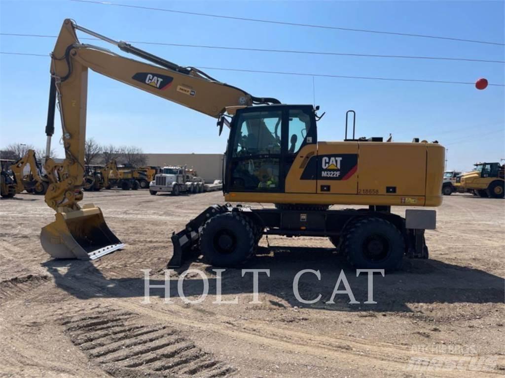 CAT M322F Gumikerekes kotrók