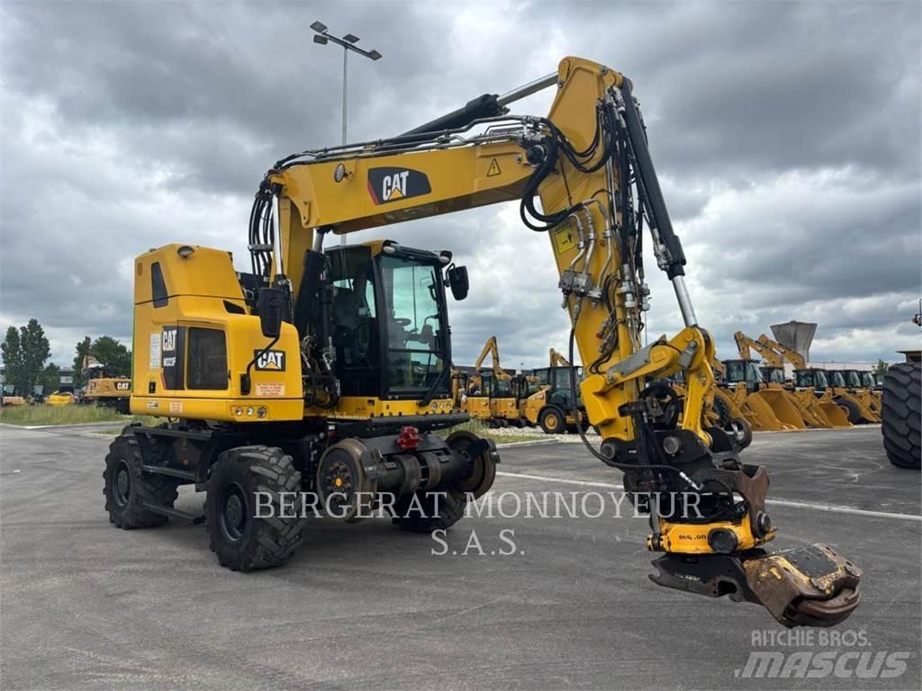 CAT M323F Gumikerekes kotrók