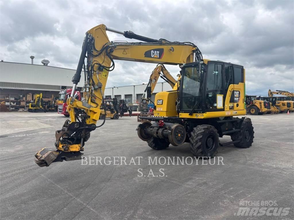 CAT M323F Gumikerekes kotrók