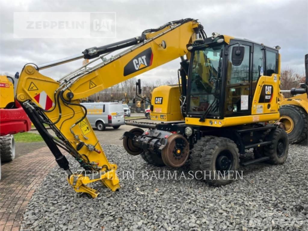 CAT M323F Gumikerekes kotrók