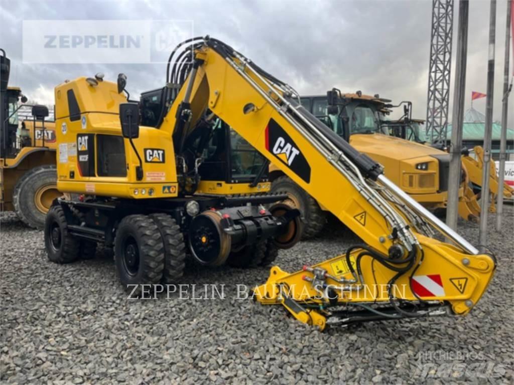 CAT M323F Gumikerekes kotrók