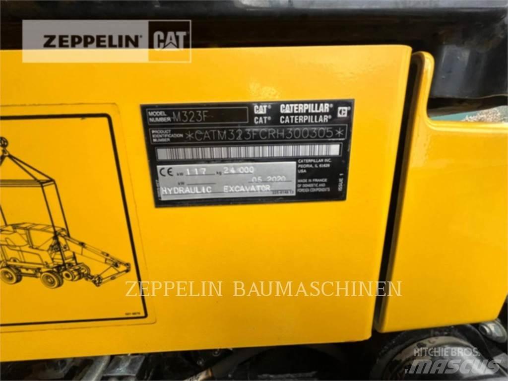 CAT M323F Gumikerekes kotrók