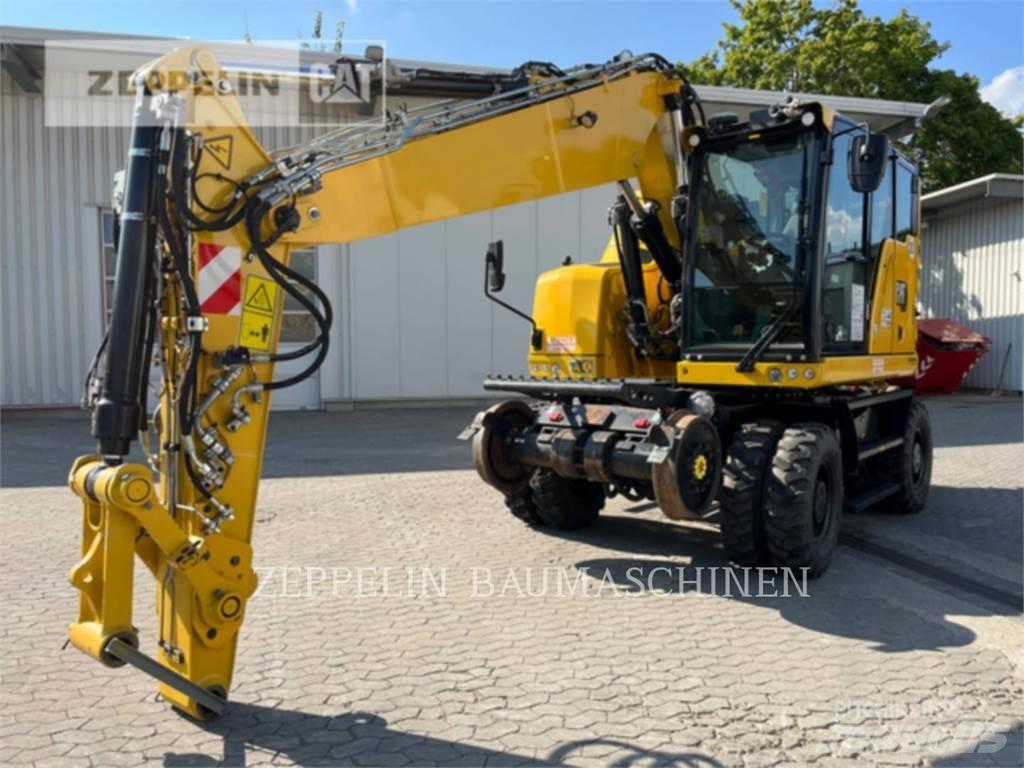 CAT M323F Gumikerekes kotrók
