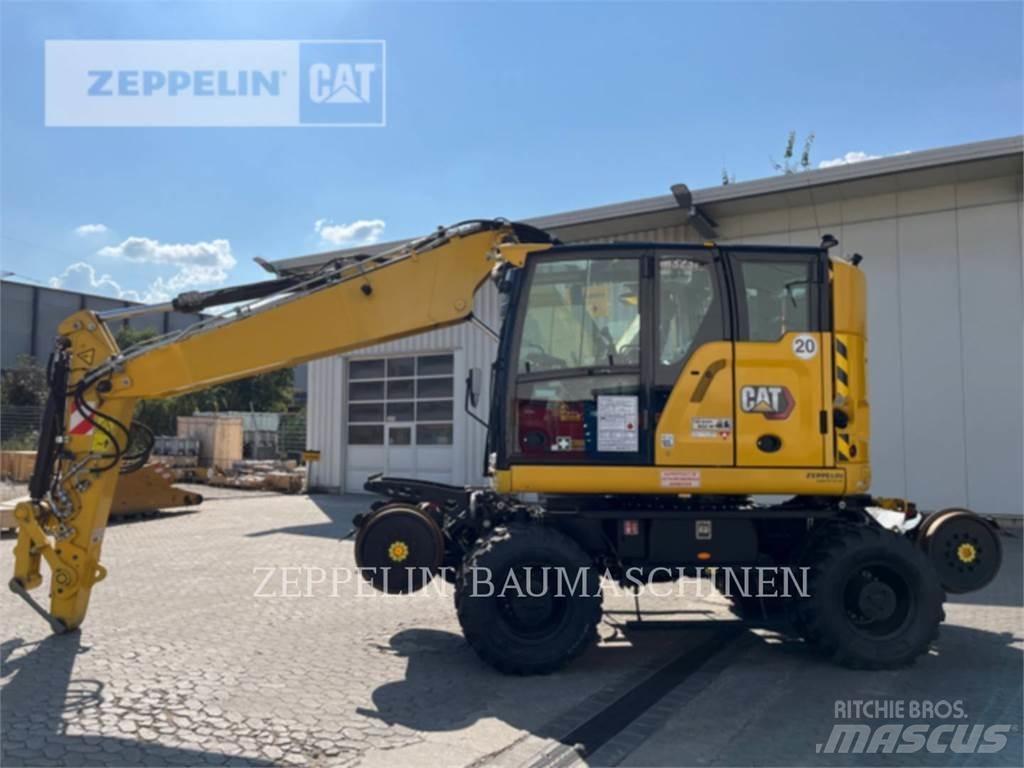 CAT M323F Gumikerekes kotrók