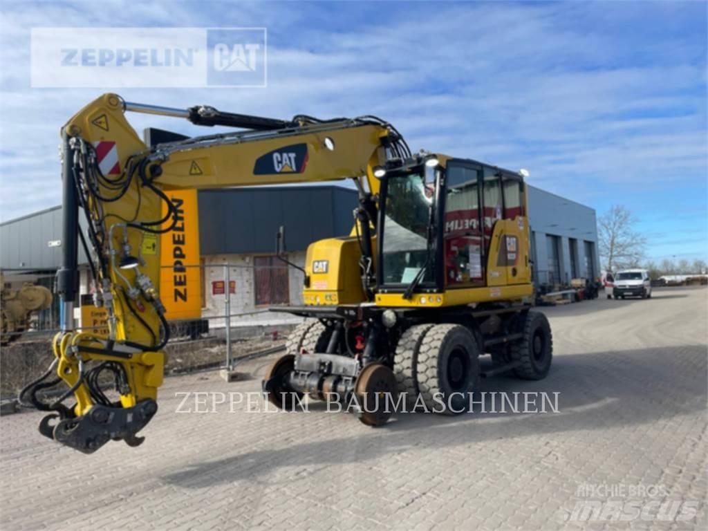 CAT M323F Gumikerekes kotrók