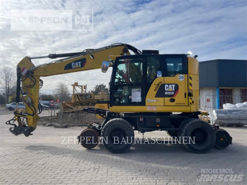 CAT M323F Gumikerekes kotrók