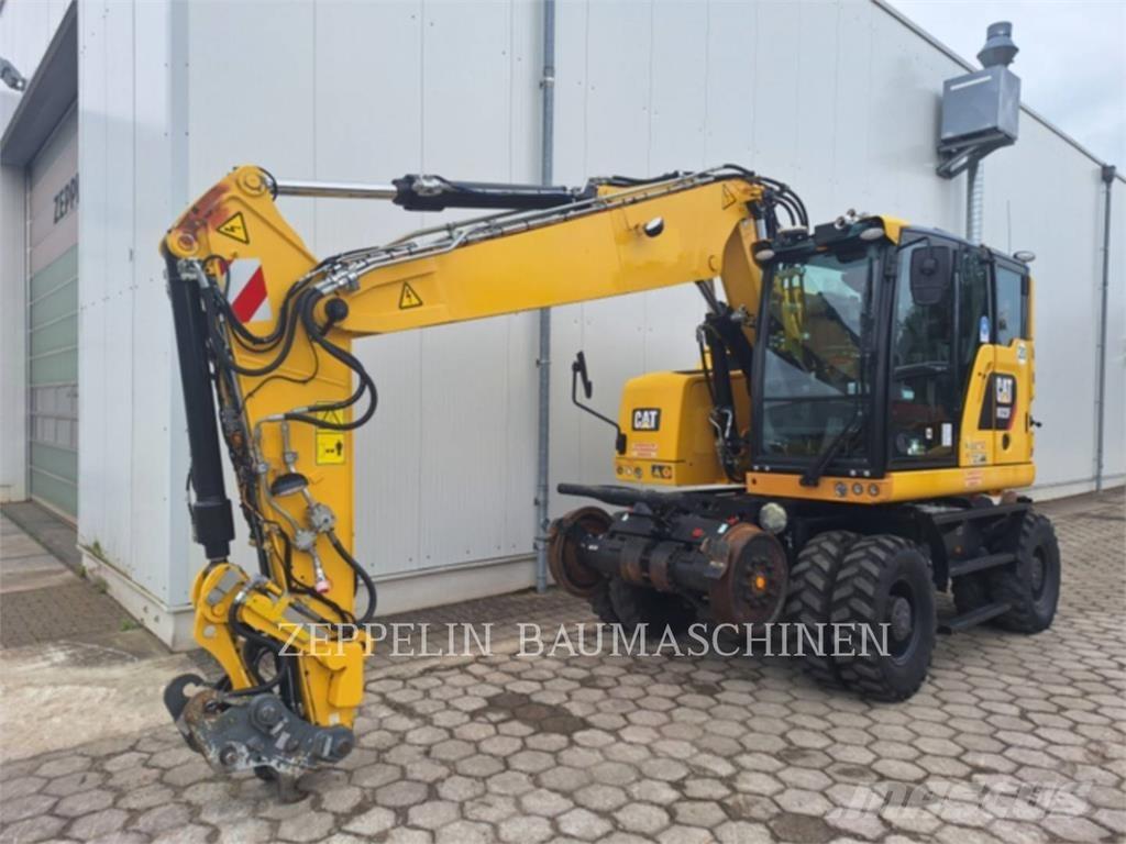 CAT M323F Gumikerekes kotrók