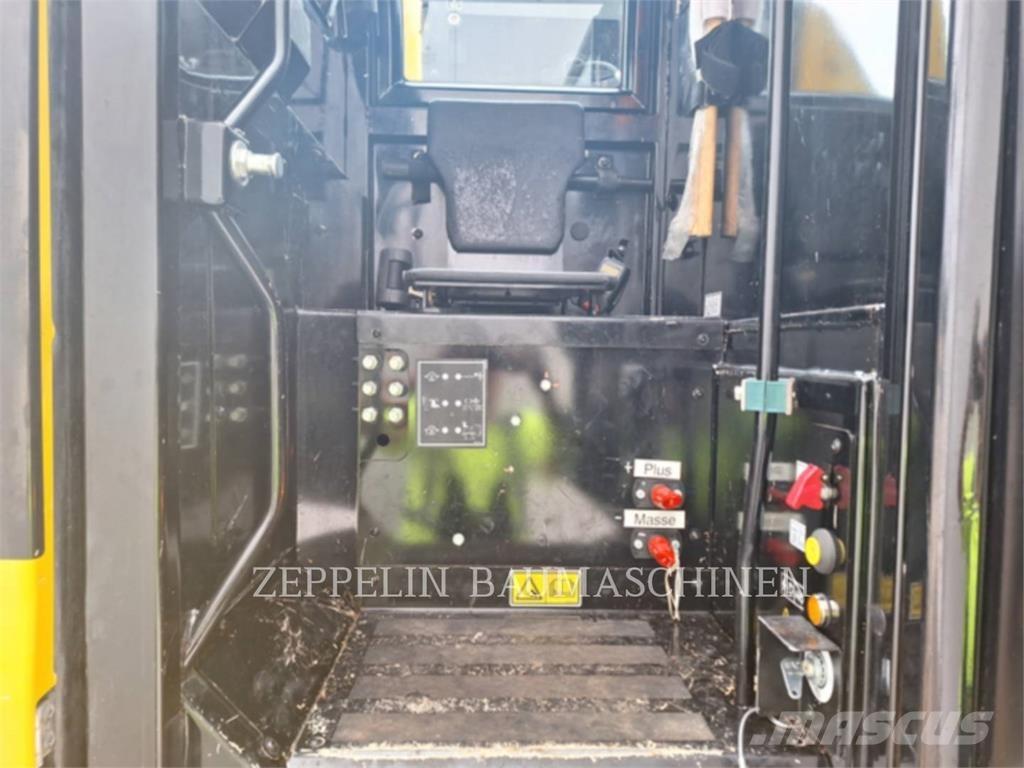 CAT M323F Gumikerekes kotrók