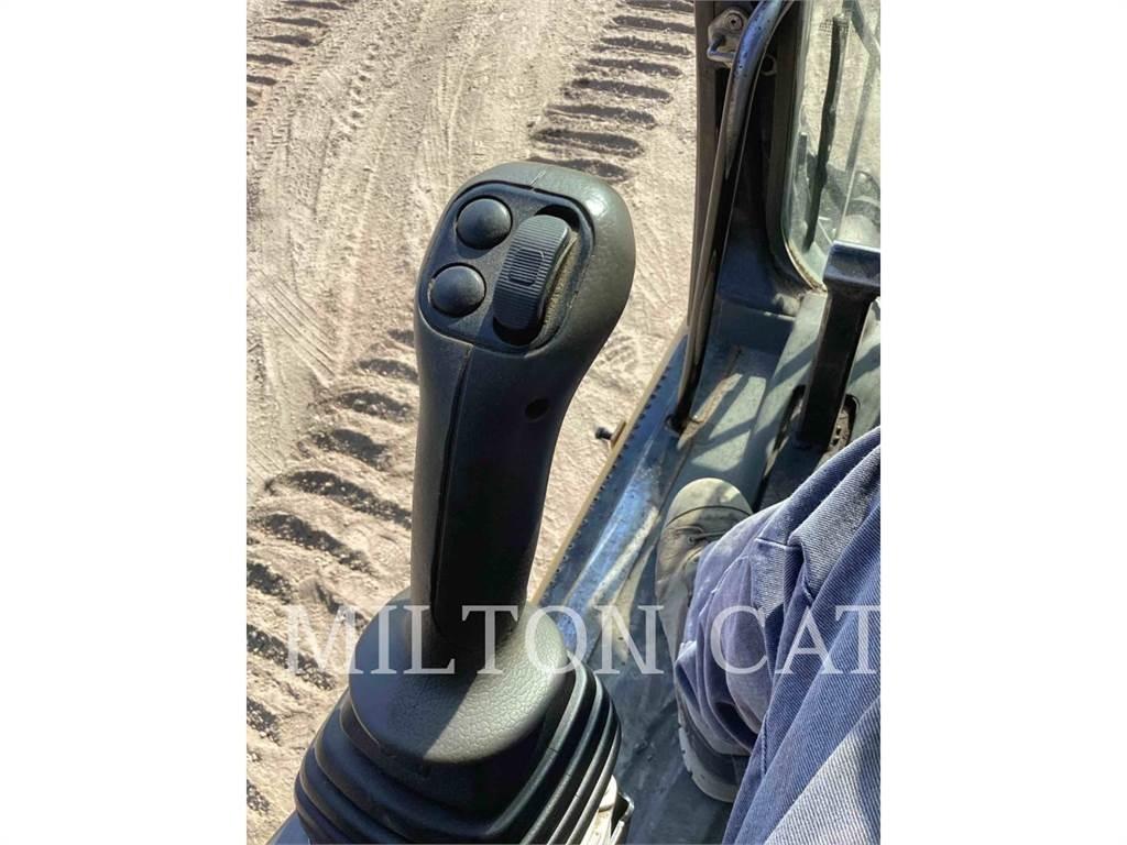 CAT M325D L MH Bontásra használt kotrók