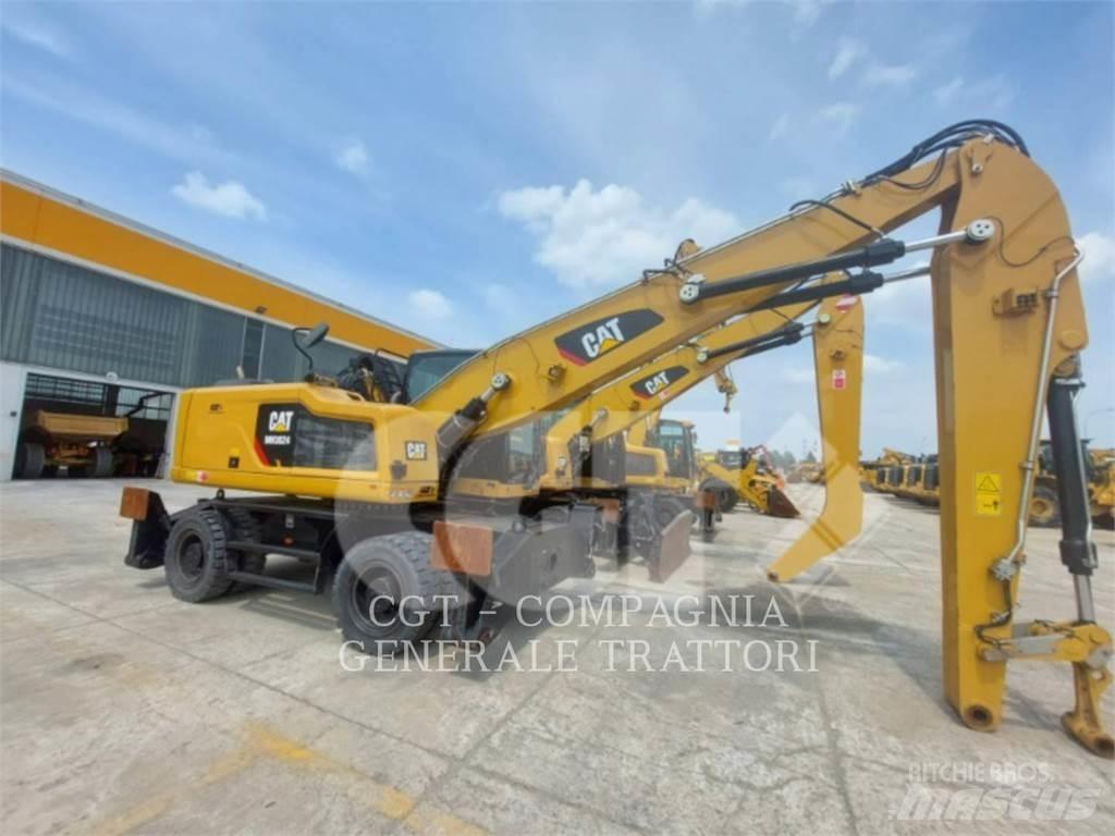 CAT MH3024 Gumikerekes kotrók