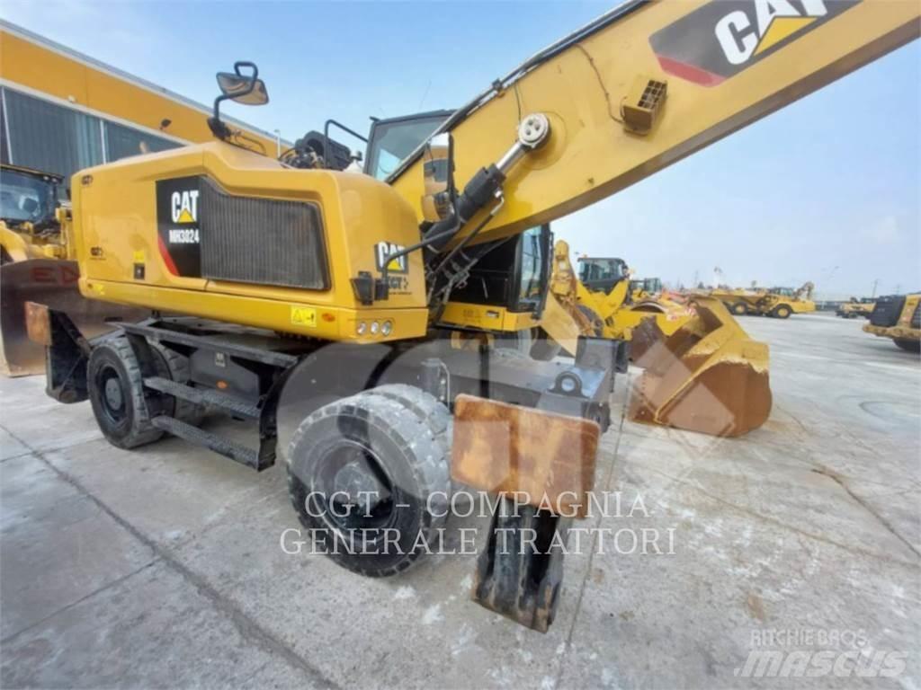 CAT MH3024 Gumikerekes kotrók