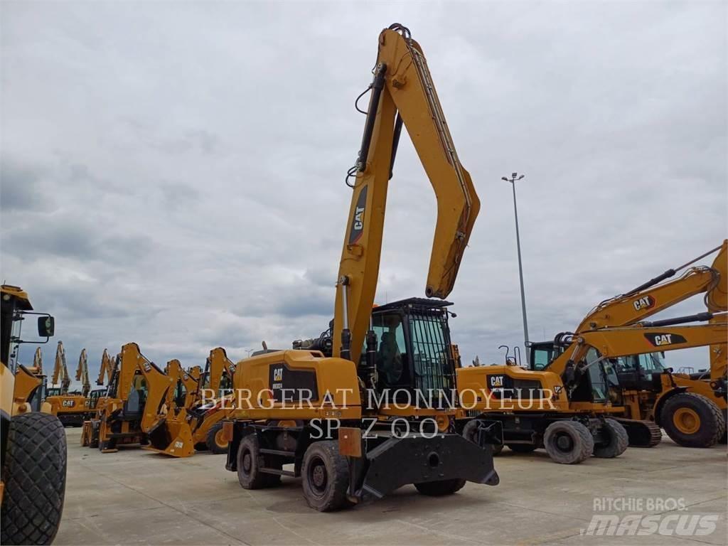 CAT MH3024 Gumikerekes kotrók