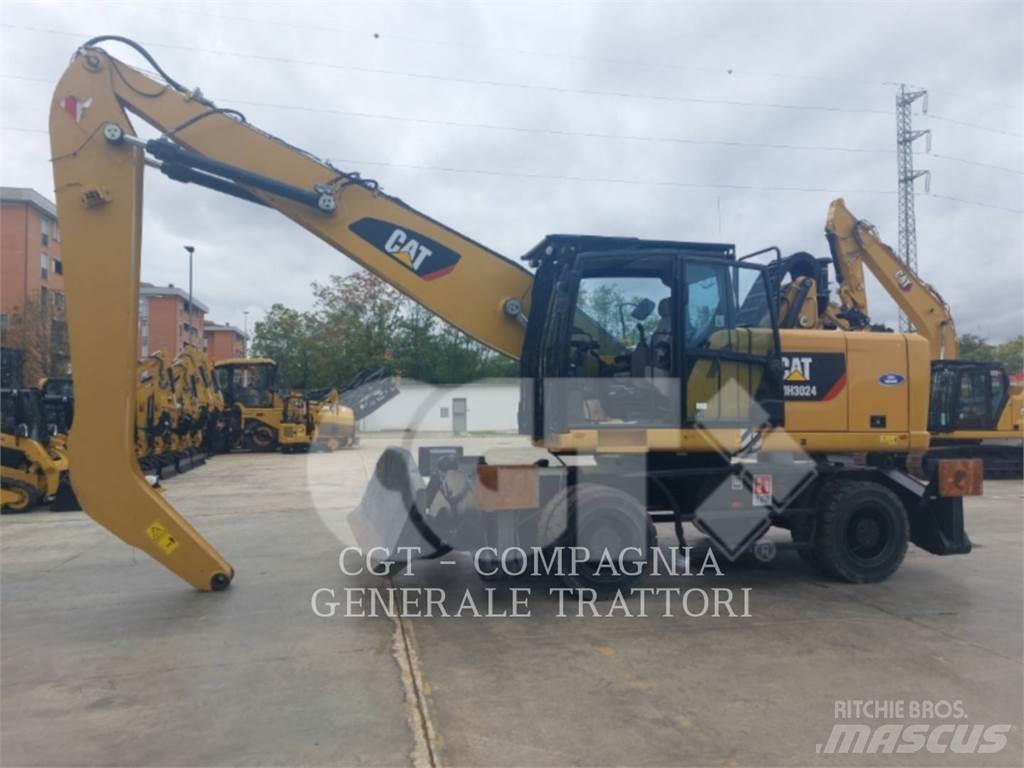 CAT MH3024 Gumikerekes kotrók