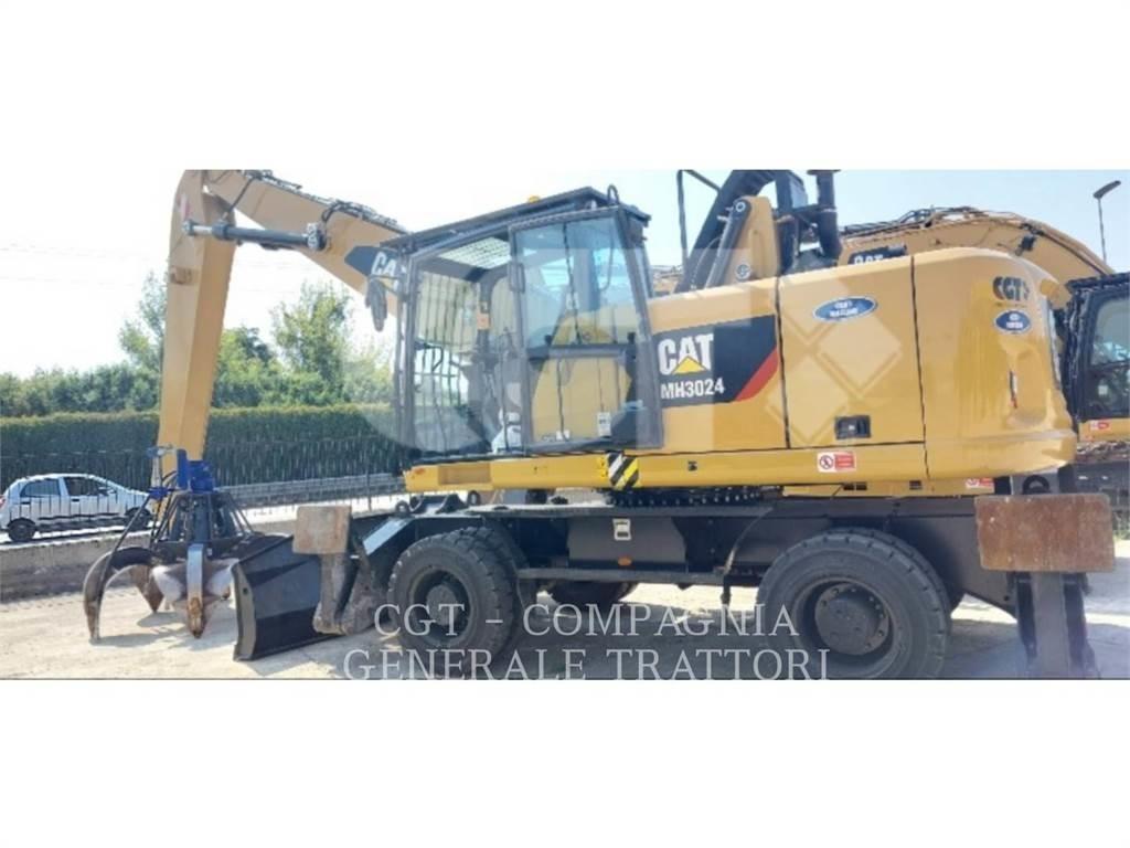 CAT MH3024 Gumikerekes kotrók