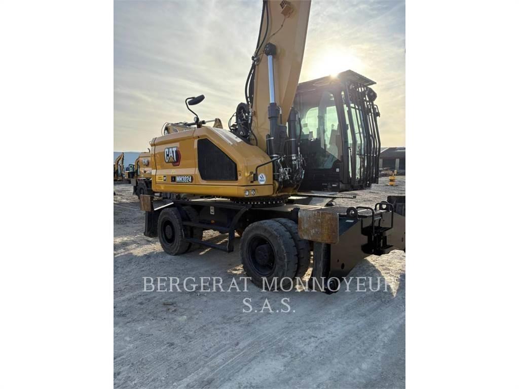 CAT MH3024 Gumikerekes kotrók