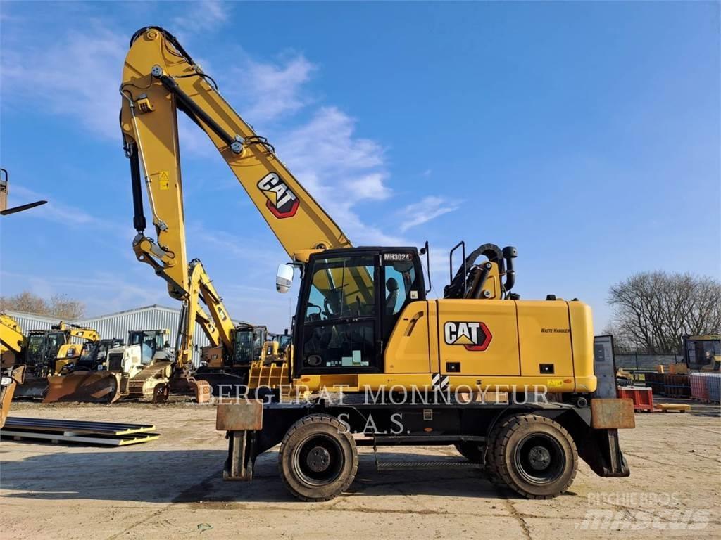 CAT MH3024 Gumikerekes kotrók