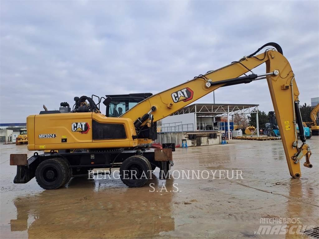 CAT MH3024 Gumikerekes kotrók