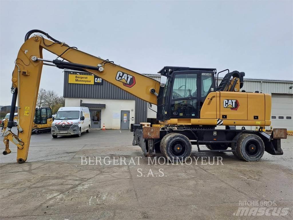 CAT MH3024 Gumikerekes kotrók