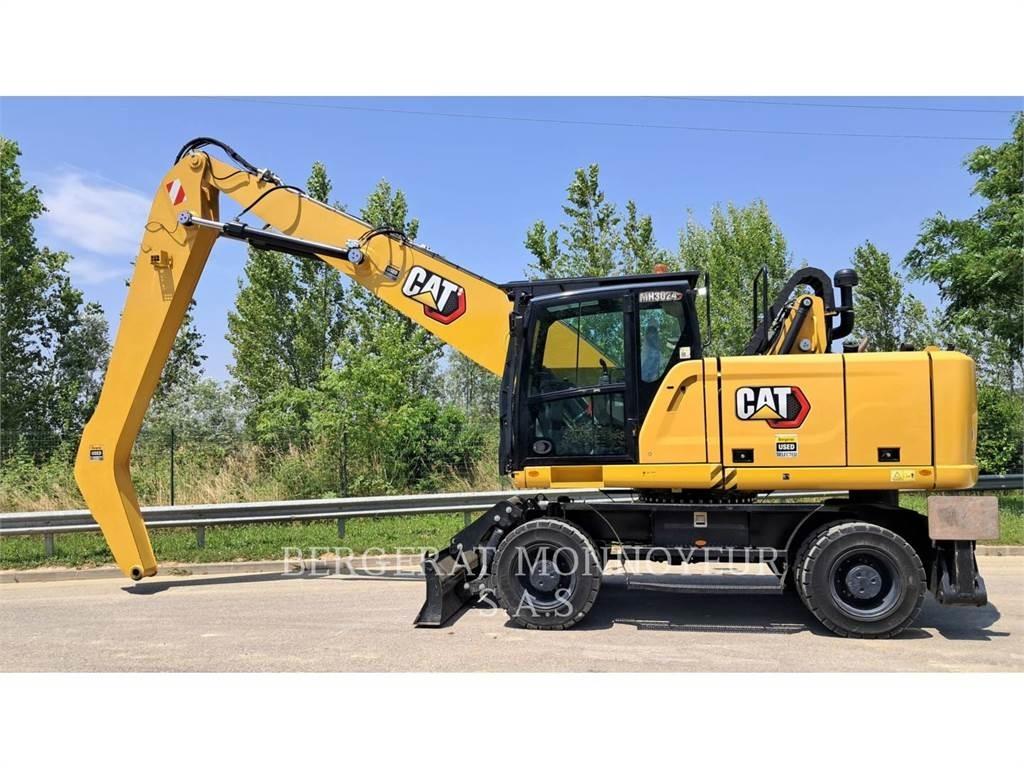 CAT MH3024-1 Gumikerekes kotrók