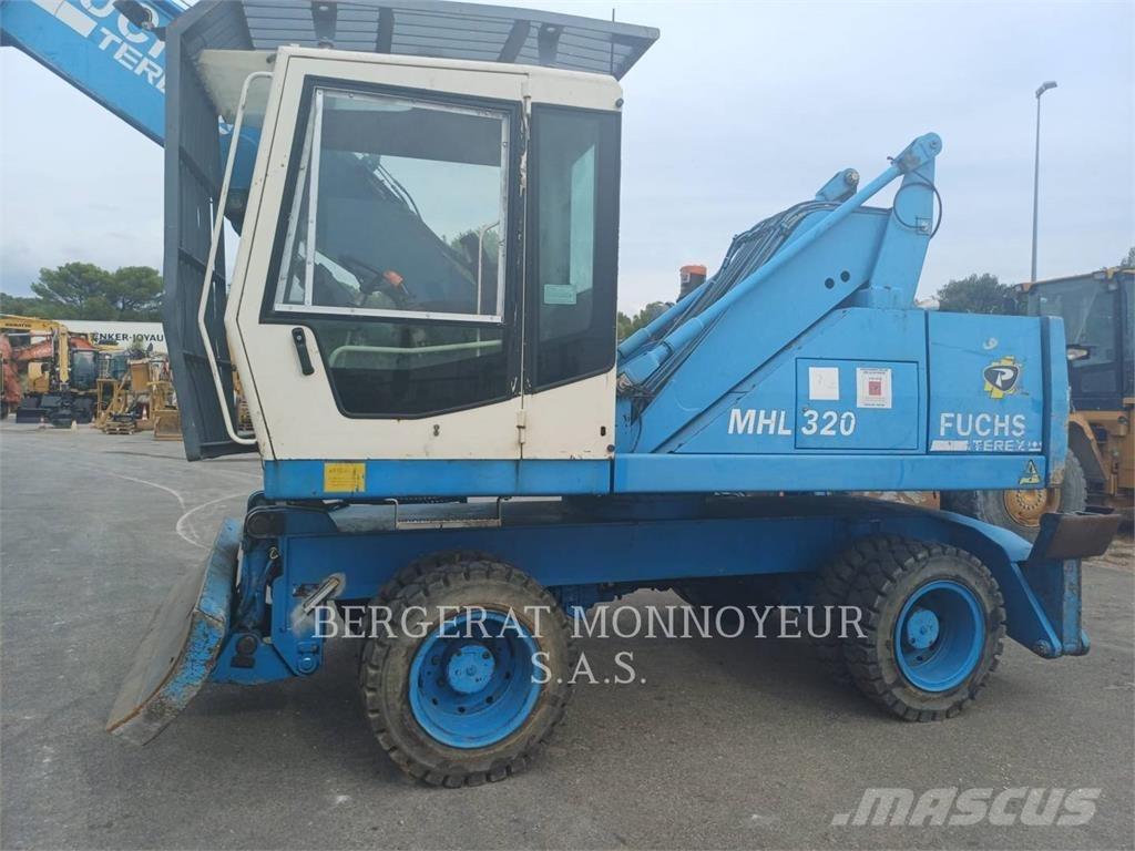 Fuchs MHL320 Gumikerekes kotrók