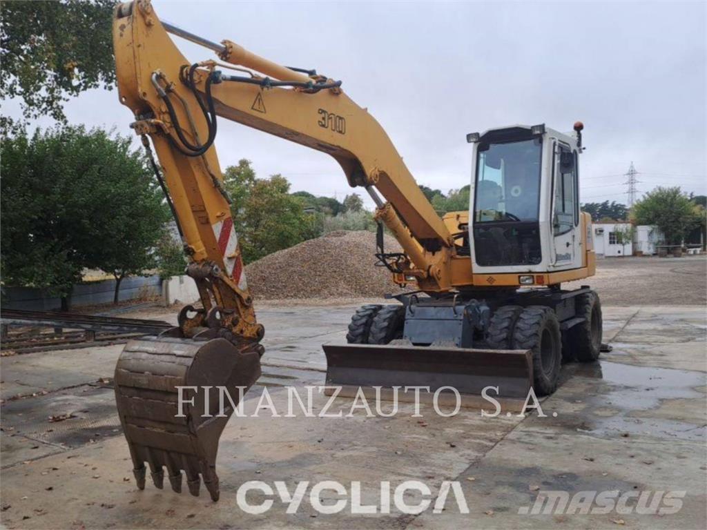 Liebherr A310B Gumikerekes kotrók