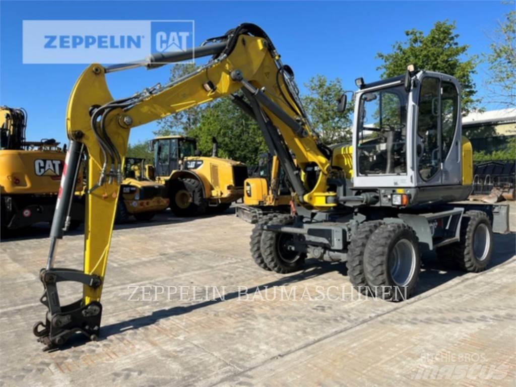 Neuson EW100 Gumikerekes kotrók