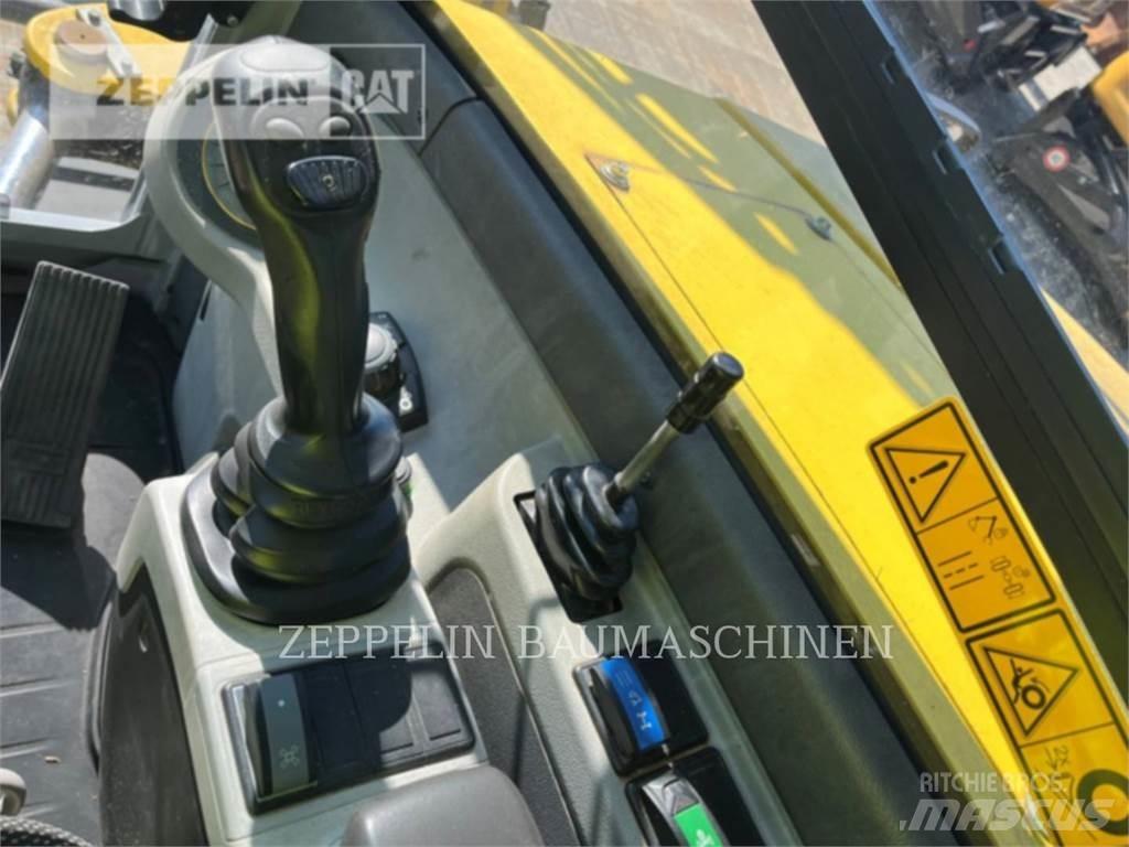 Neuson EW100 Gumikerekes kotrók