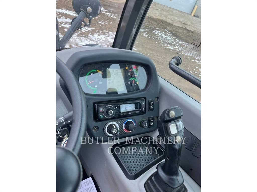 New Holland 321F Gumikerekes homlokrakodók