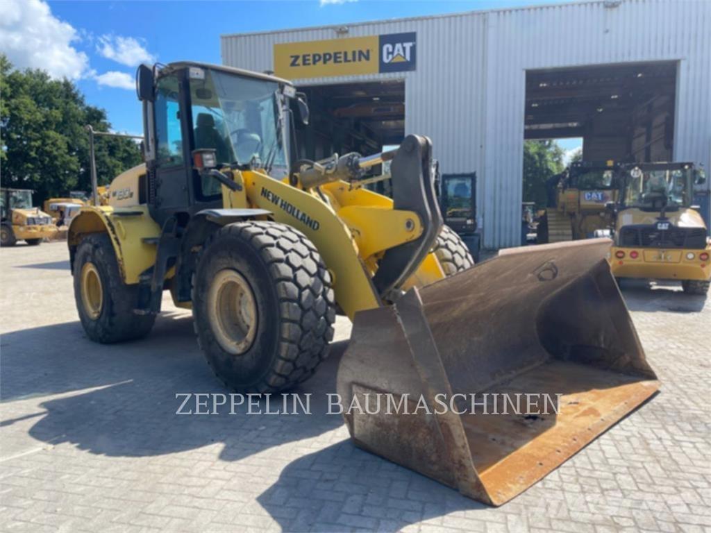 New Holland W190 Gumikerekes homlokrakodók