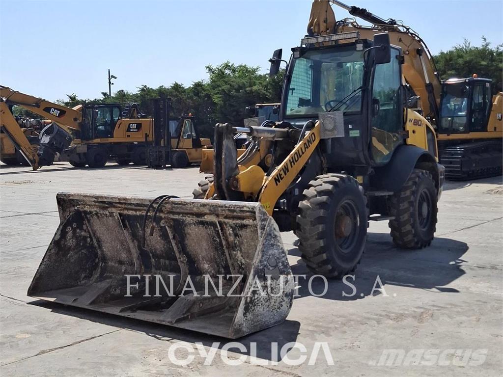 New Holland W80C Gumikerekes homlokrakodók