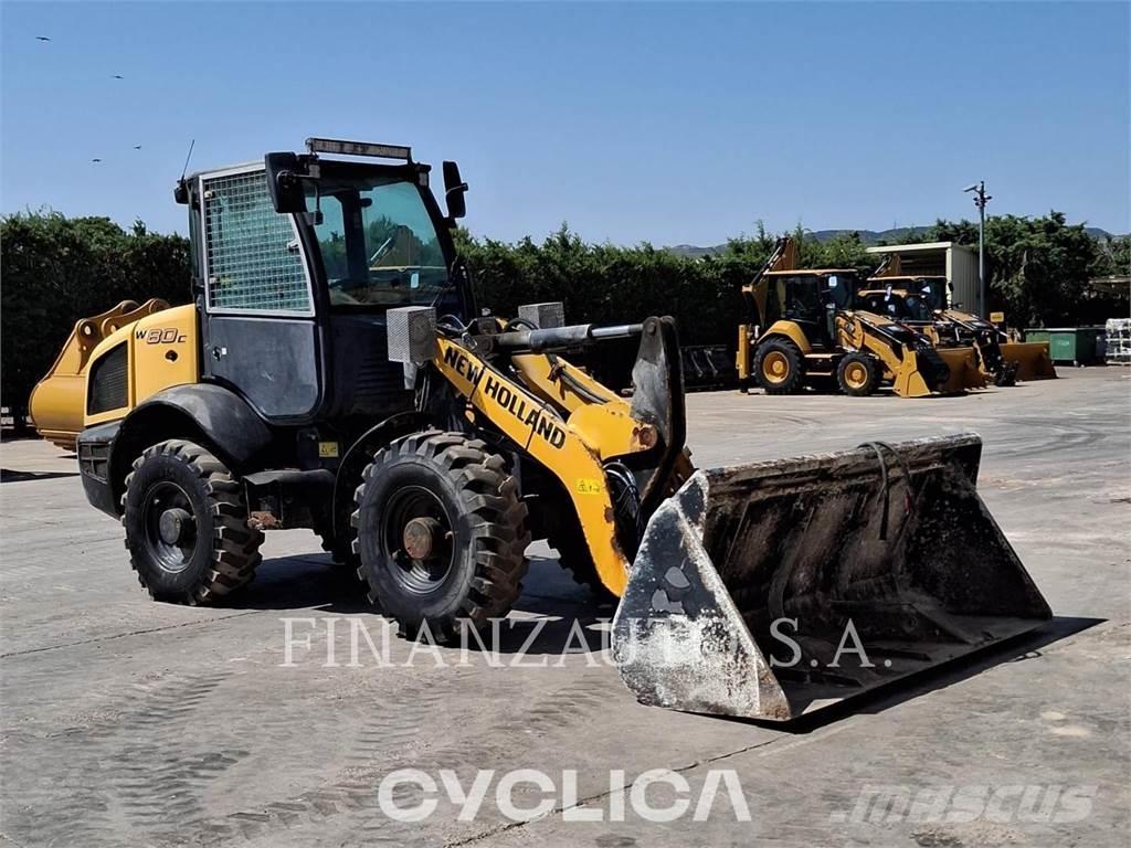 New Holland W80C Gumikerekes homlokrakodók