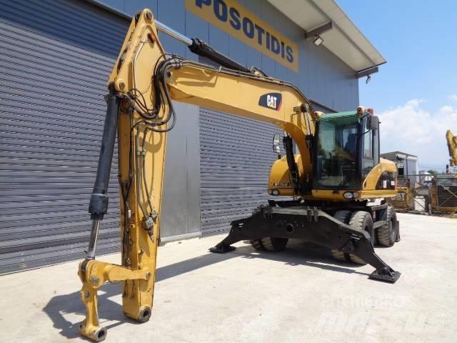 CAT M 318 D Gumikerekes kotrók