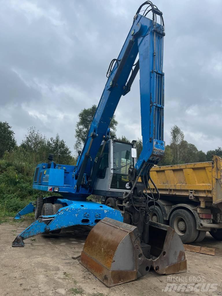 Fuchs MHL 320 Gumikerekes kotrók