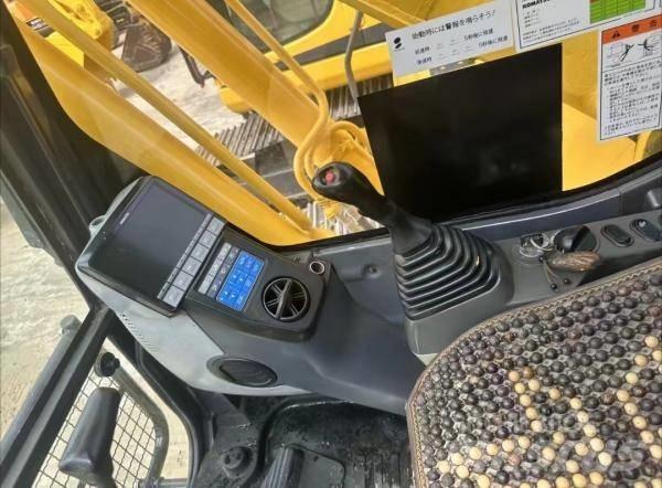 Komatsu PC 200 Közepes (midi) kotrók 7 t - 12 t