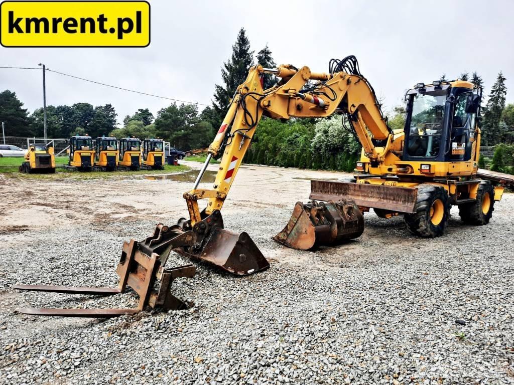 Komatsu PW 118 Gumikerekes kotrók