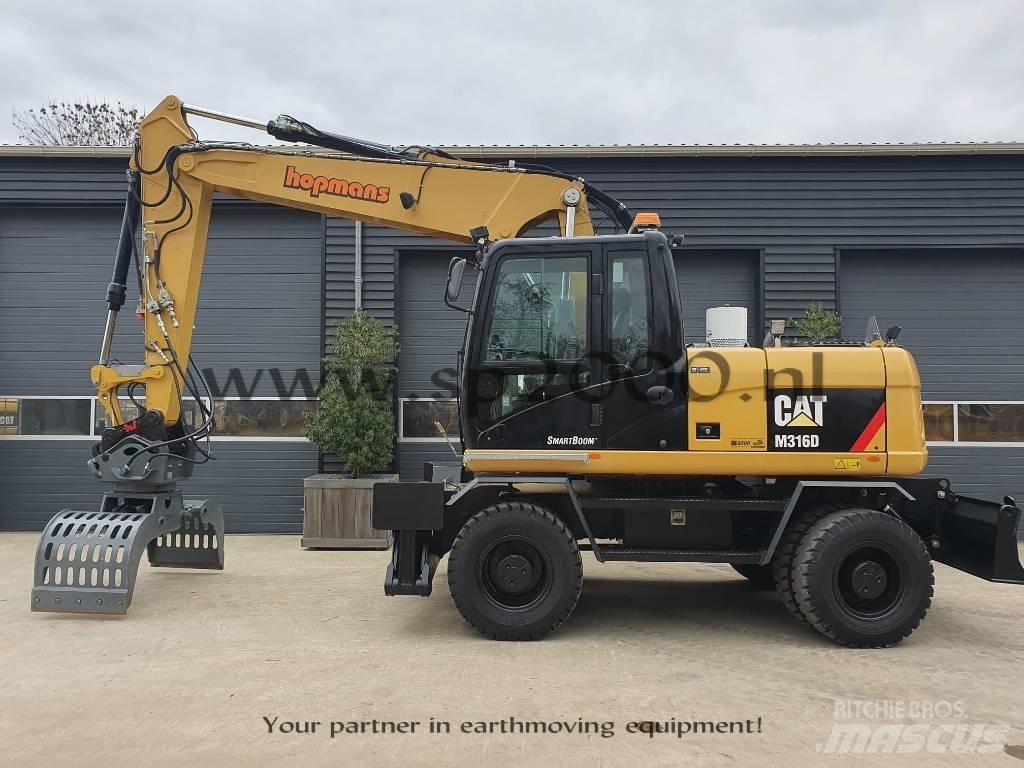 CAT M316D Gumikerekes kotrók