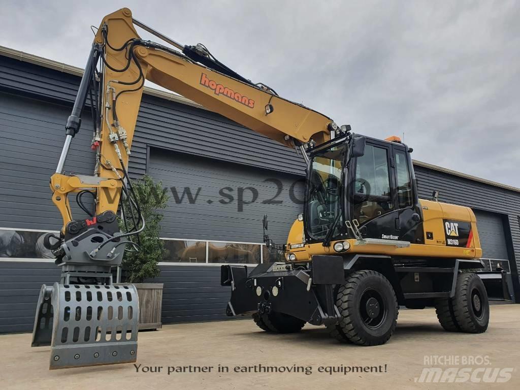 CAT M316D Gumikerekes kotrók
