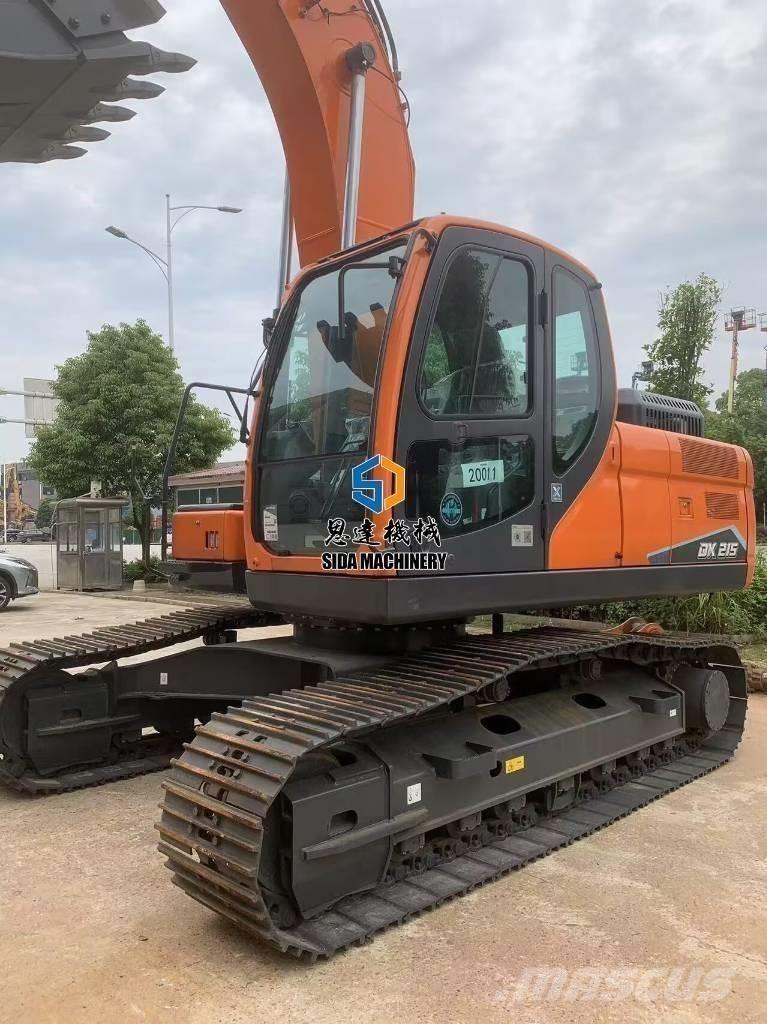 Develon DX 215 Közepes (midi) kotrók 7 t - 12 t