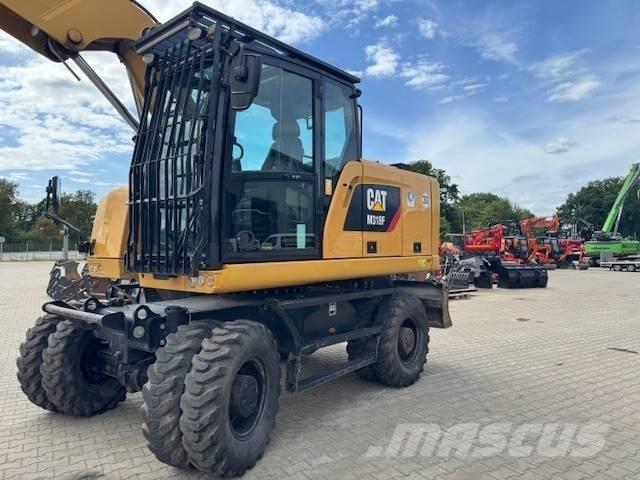 CAT M 318 F Gumikerekes kotrók