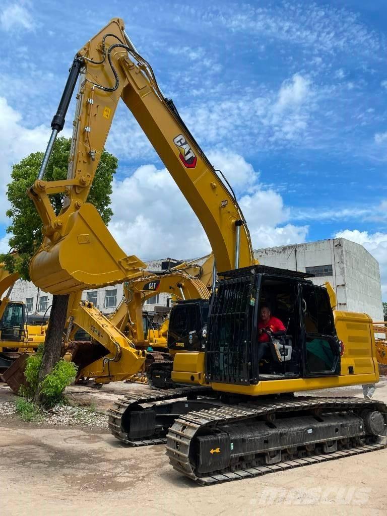 CAT 323 Közepes (midi) kotrók 7 t - 12 t