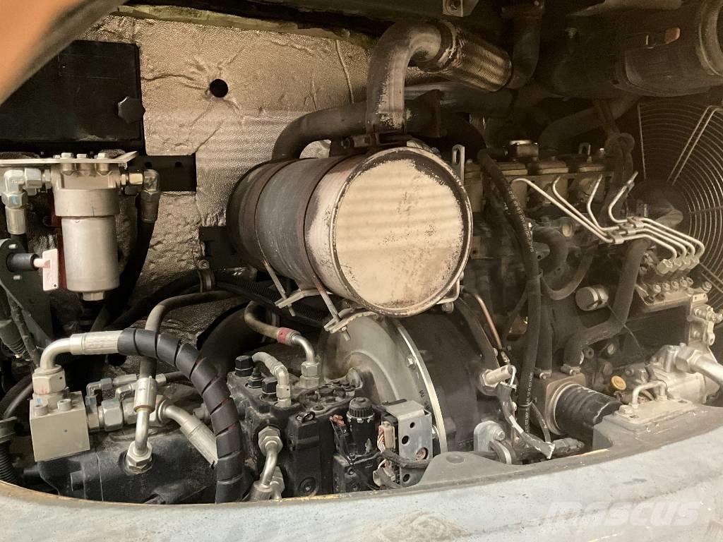 Neuson EW 65 Gumikerekes kotrók