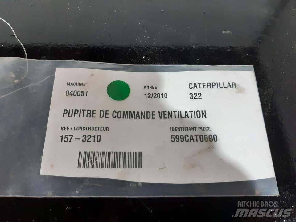 CAT 322 Vezetőfülke és belső tartozékok